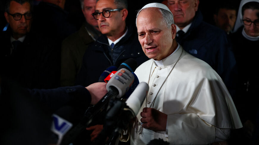 Pope Leo XIV speaks to the media on the U.S.–Israeli conflict with Iran, as he leaves the papal residence to head back to the Vatican, in Castel Gandolfo, Italy, April 7, 2026. REUTERS/Guglielmo Mangiapane