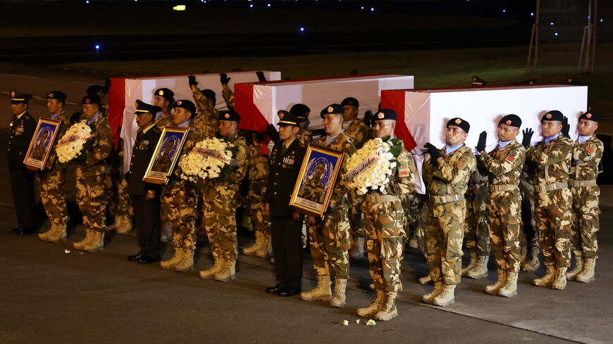 Indonesian military personnel carry coffins of United Nations Interim Force in Lebanon (UNIFIL) peacekeepers killed in Lebanon, during a military honour ceremony at Soekarno-Hatta International Airport, in Tangerang, on the outskirts of Jakarta, Indonesia, April 4, 2026. REUTERS/Ajeng Dinar Ulfiana