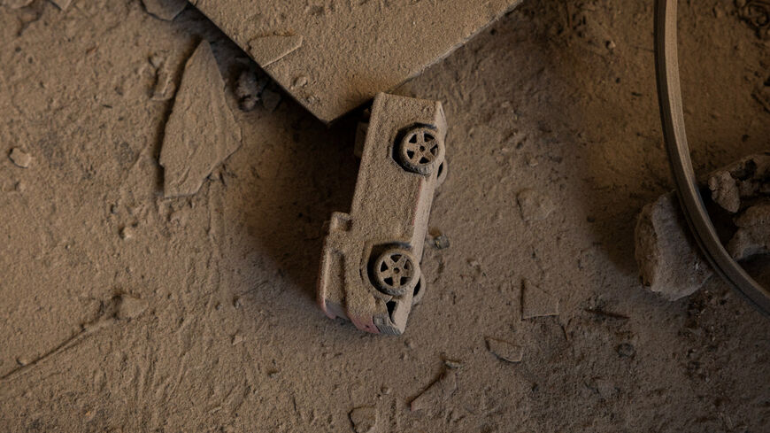 A dust-covered toy truck lies inside a house damaged during Israeli strikes on Wednesday in Ain Al Mraiseh, Beirut, Lebanon, April 10, 2026. REUTERS/Adnan Abidi