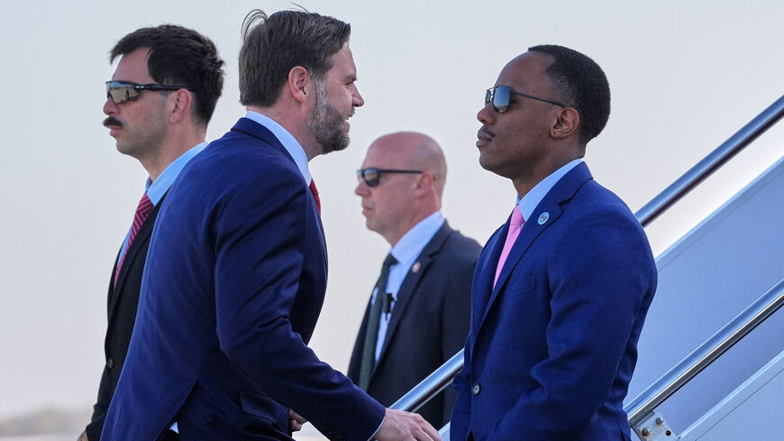 U.S. Vice President JD Vance boards Air Force Two for expected departure to Pakistan for talks on Iran, at Joint Base Andrews, Maryland, U.S., April 10, 2026. Jacquelyn Martin/Pool via REUTERS