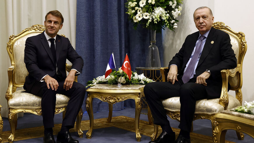 French President Emmanuel Macron meets with Turkey's President Recep Tayyip Erdogan on the day of the Gaza International Peace Summit in Sharm el-Sheikh, Egypt, October 13, 2025. Yoan Valat/Pool via REUTERS