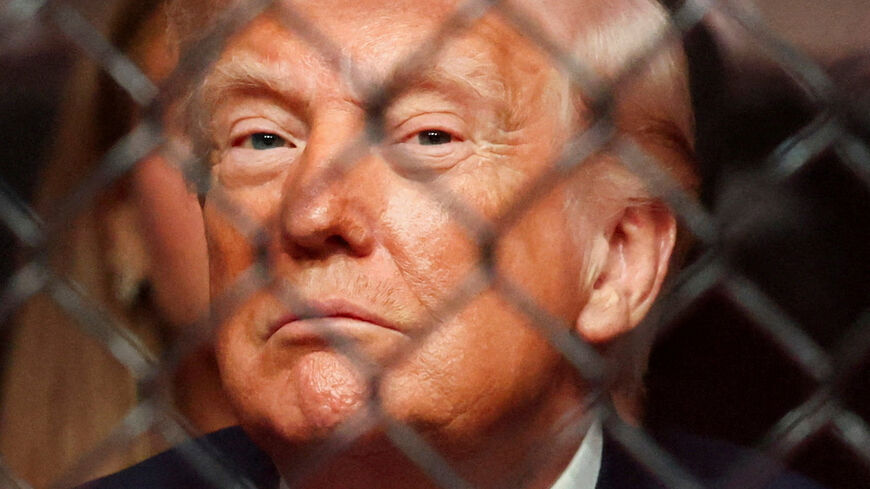 U.S. President Donald Trump watches a match during the UFC 327 event at Kaseya Center in Miami, Florida, U.S., April 11, 2026.  REUTERS/Kevin Lamarque      TPX IMAGES OF THE DAY