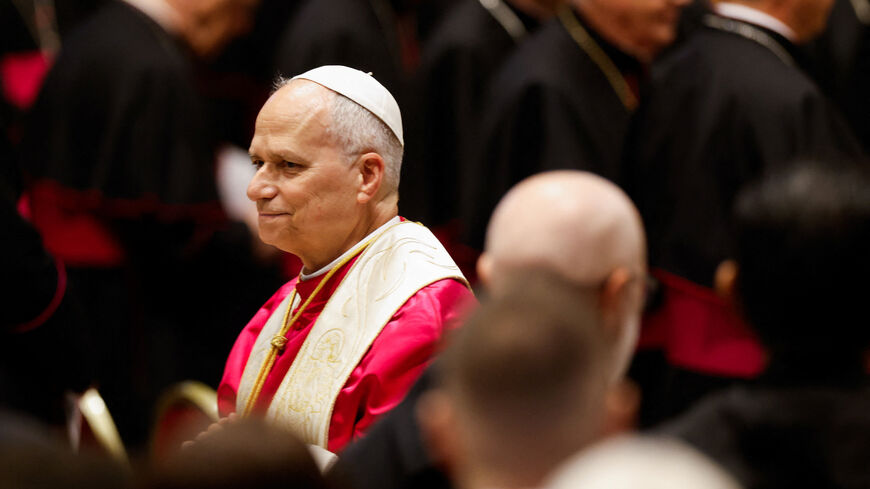 Pope Leo XIV leaves after presiding over a Prayer Vigil and Rosary for Peace, in Saint Peter's Basilica at the Vatican, April 11, 2026. REUTERS/Remo Casilli