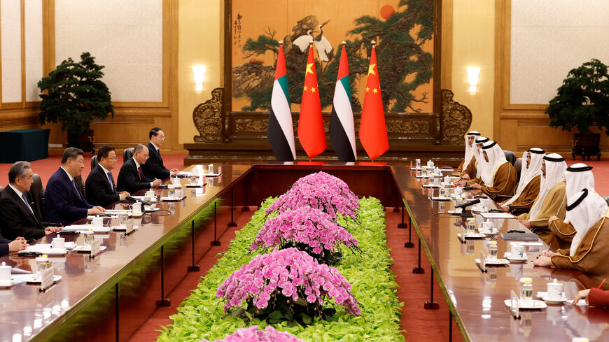 China's President Xi Jinping and Sheikh Khaled bin Mohamed bin Zayed AI Nahyan, Crown Prince of Abu Dhabi, United Arab Emirates, attend a meeting at the Great Hall of the People, in Beijing April 14, 2026. Haruna Furuhashi/Pool via REUTERS