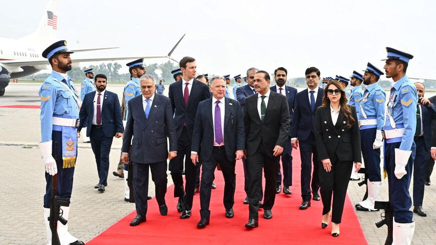 U.S. Special Envoy Steve Witkoff and Jared Kushner walk with Pakistan's Chief of Defence Forces and Chief of Army Staff Field Marshal Asim Munir, and Pakistani Deputy Prime Minister and Foreign Minister Mohammad Ishaq Dar after arriving for peace talks with Iranian officials in Islamabad, Pakistan, Saturday, April 11, 2026. Pakistan's Ministry of Foreign Affairs/Handout via REUTERS