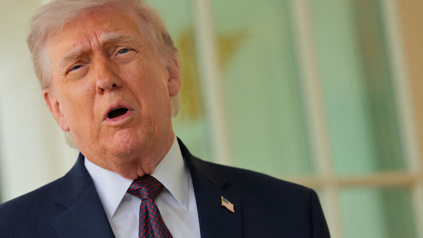 U.S. President Donald Trump speaks with the media at the White House in Washington, D.C., U.S., April 13, 2026. REUTERS/Jonathan Ernst