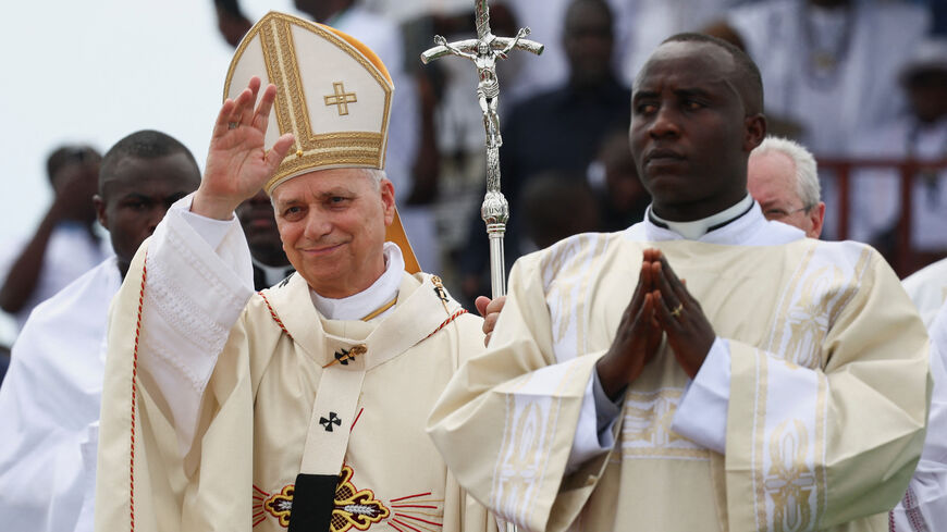 Pope Leo XIV arrives to hold a holy Mass near Japoma Stadium in Douala, Cameroon, April 17, 2026. REUTERS/Guglielmo Mangiapane