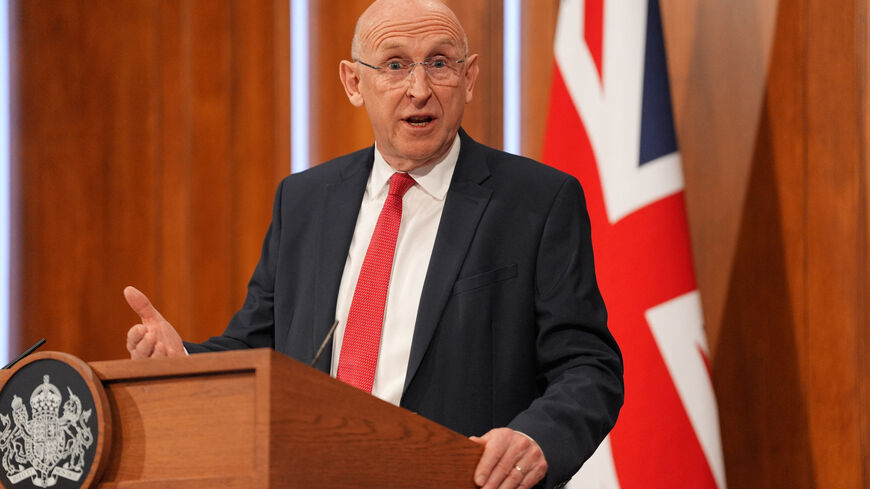 Britain's Defence Secretary John Healey delivers a statement on recent UK operational activity, he said the UK and allies monitored a Russian attack submarine and two spy submarines in the North Atlantic for a month before they retreated, at 9 Downing Street in Westminster, central London, Britain, April 9, 2026. Yui Mok/Pool via REUTERS