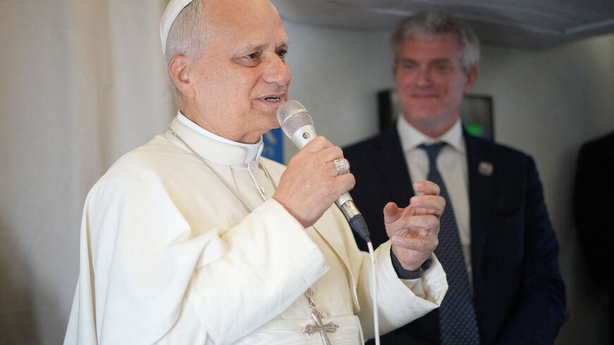 Pope Leo XIV speaks to journalists aboard the papal flight from Malabo to Rome, April 23, 2026, at the end of his 11-day pastoral visit to Africa. Andrew Medichini/Pool via REUTERS