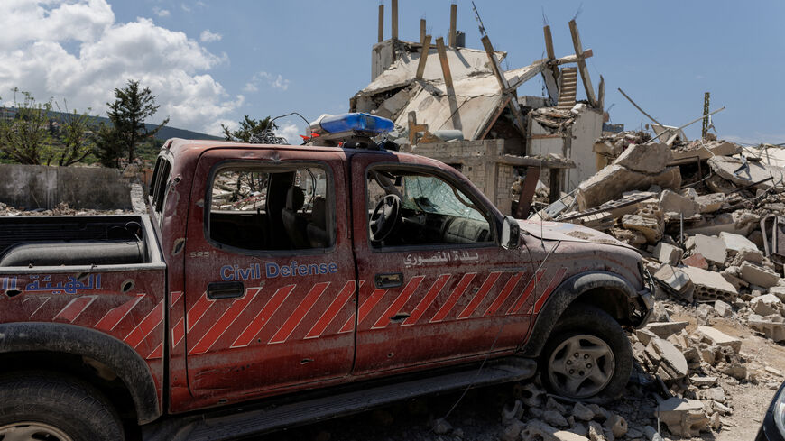 A damaged civil defence car parks in front of a house damaged by an Israeli strike, amid a 10-day ceasefire between Lebanon and Israel, in Mansouri village, southern Lebanon, April 21, 2026. REUTERS/Zohra Bensemra