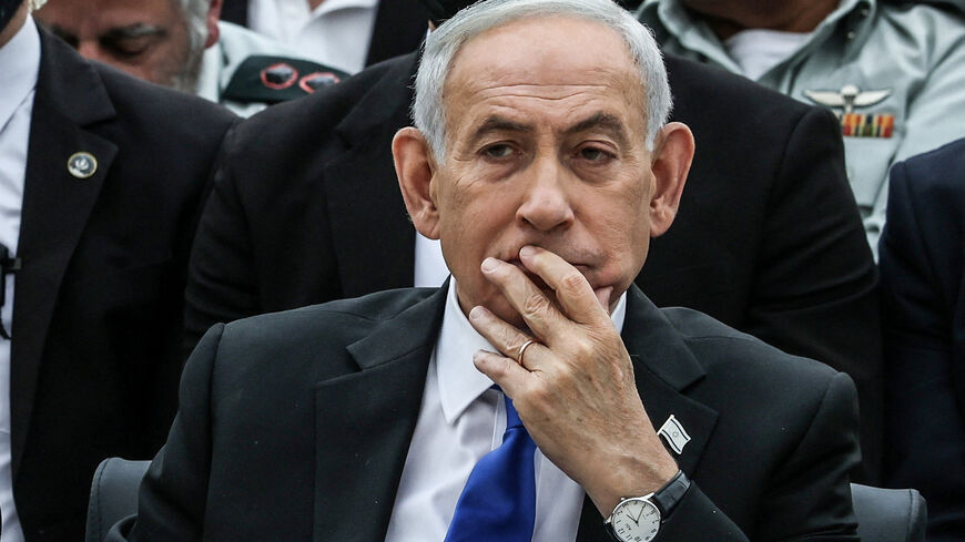 Israel’s Prime Minister Benjamin Netanyahu attends a ceremony commemorating Israel’s Remembrance Day for fallen soldiers, or Yom HaZikaron, at the Military Cemetery on Mount Herzl in Jerusalem April 21, 2026.     ILIA YEFIMOVICH/Pool via REUTERS