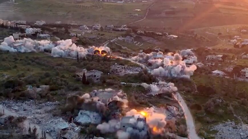A screen grab image taken from a handout video released by the Israeli army shows footage of what it says is the destruction of Hezbollah infrastructure in Lebanon, where a ceasefire has been in place since mid-April