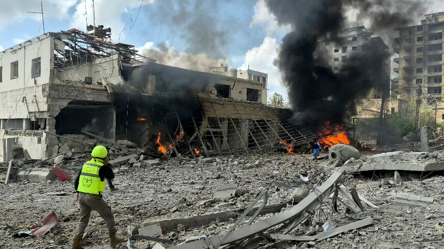 First responders at the site of an April 10, 2026 Israeli airstrike on the Lebanese State Security Center in the southern Lebanese city of Nabatieh