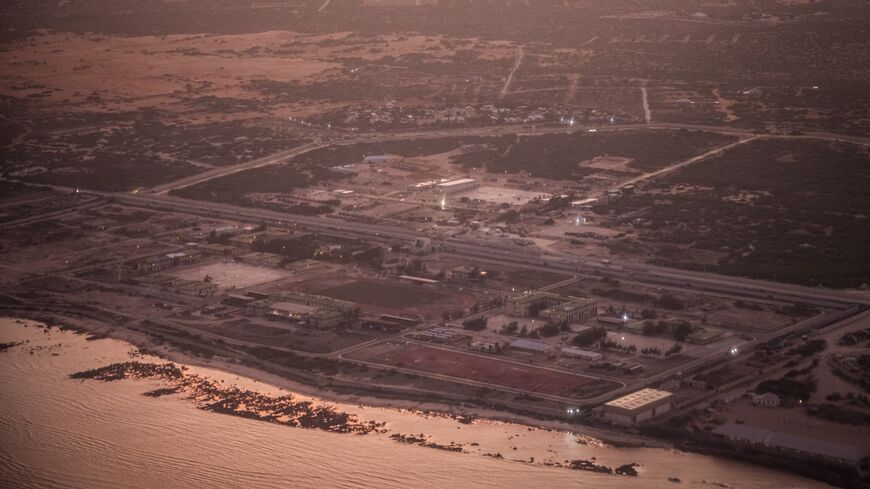 Turkey's Camp TURKSOM, a Turkish military base south of Mogadishu, is seen from the window of an aircraft, on April 26, 2025, in Mogadishu, Somalia. 