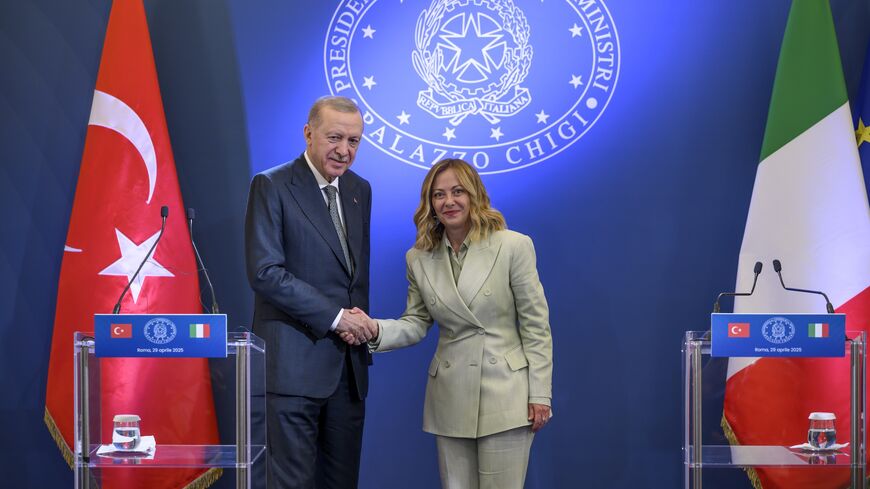 Turkish President Recep Tayyip Erdogan and Italian Prime Minister Giorgia Meloni shake hands during the press conference following their meeting at Villa Doria Pamphilj, on April 29, 2025, in Rome, Italy.