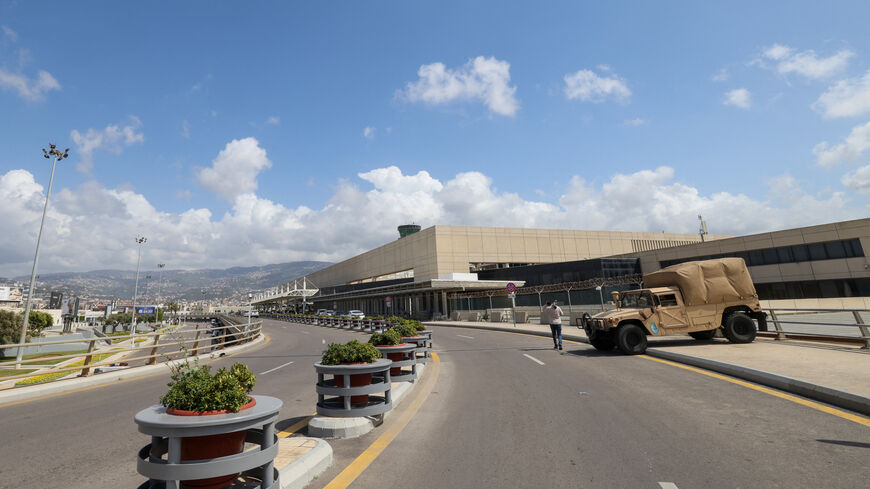 A Lebanese army vehicle is parked at the departures area of Beirut's Rafik Hariri airport on April 10, 2026. Israel's military on April 9 warned residents of Beirut's southern suburbs, long a stronghold of Lebanese militant group Hezbollah, of imminent strikes and called for them to evacuate. While Israel regularly issues evacuation warnings before bombing the southern suburbs, the announcement also included the outskirts of Lebanon's only international airport. (Photo by Anwar AMRO / AFP via Getty Images)