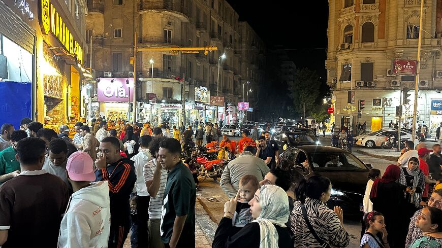 Cairo's famed nocturnal rhythm flickered back to life on Tuesday after Egypt eased energy-saving measures spurred by the Middle East war that had forced shops, cafes and restaurants to close early