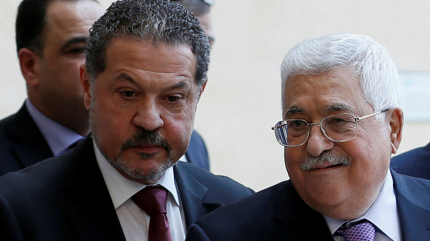 Palestinian President Mahmoud Abbas, accompanied by his son Yasser, leaves a hospital in Ramallah in the Israeli-occupied West Bank, May 28, 2018. REUTERS/Mohamad Torokman/File Photo