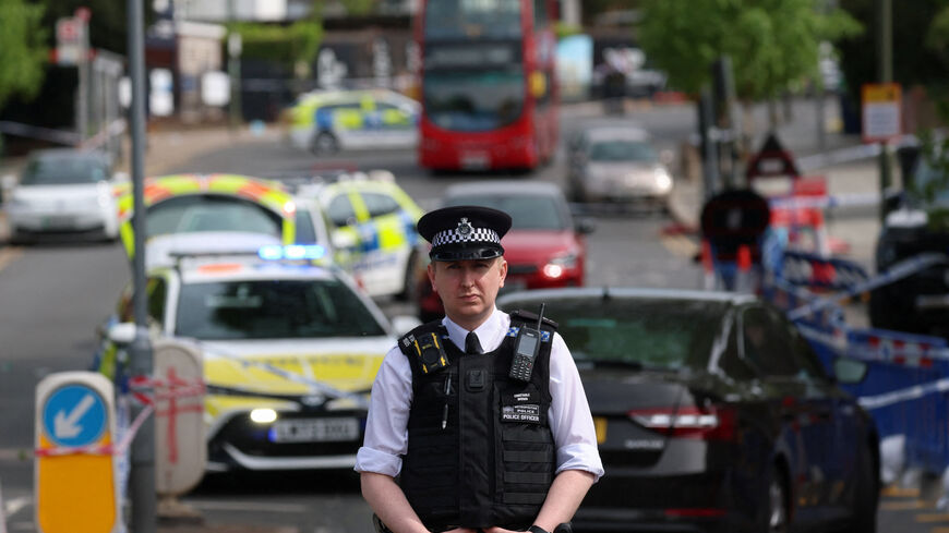 A police officer stands at the scene, after a man was arrested following a stabbing incident in the Golders Green area, which is home to a large Jewish population, in London, Britain, April 29, 2026. REUTERS/Hannah McKay