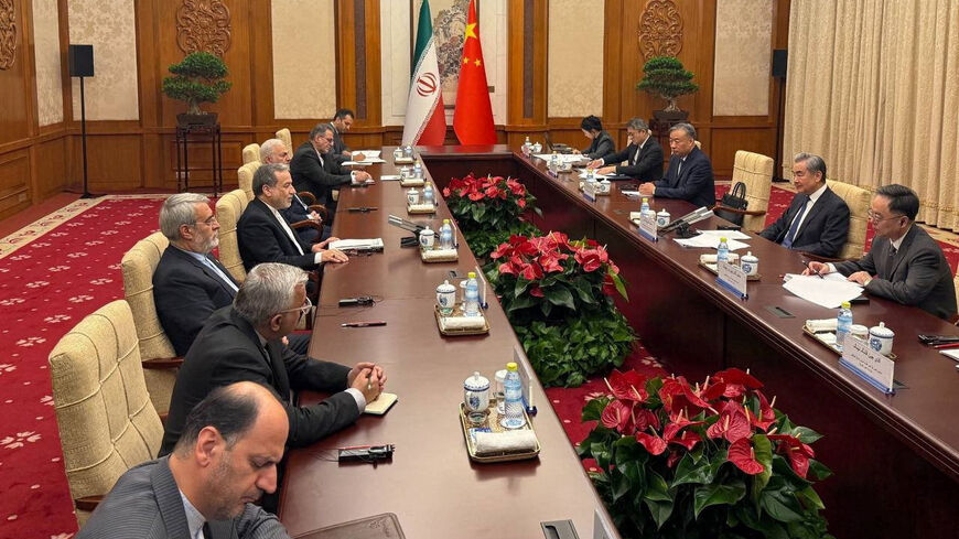 Iranian Foreign Minister Abbas Araqchi meets with Chinese Foreign Minister Wang Yi in a location given as Beijing, China, in this handout image released May 6, 2026. Seyed Abbas Araqchi via Telegram/Handout via REUTERS