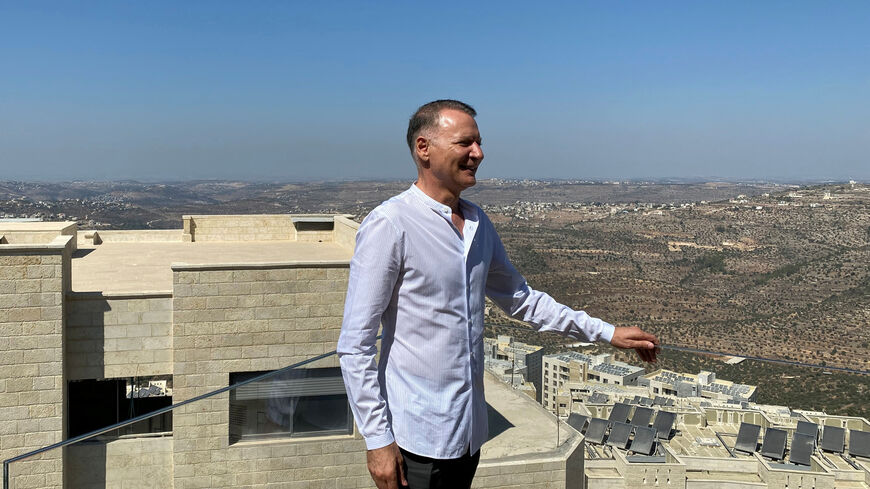 Bashar Masri, a prominent Palestinian businessman and founder of Rawabi, the first planned Palestinian city in the West Bank, poses during an interview with Reuters in Rawabi, October 5, 2020. REUTERS/Rami Ayyub/File Photo