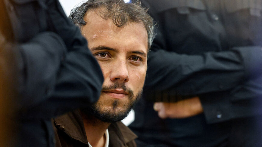FILE PHOTO: Brazilian Activist Thiago Avila, who was detained aboard the Gaza-bound Global Sumud Flotilla, which was intercepted by Israeli forces in international waters, appears at a court in Beersheba, southern Israel May 6, 2026. REUTERS/Amir Cohen/File Photo