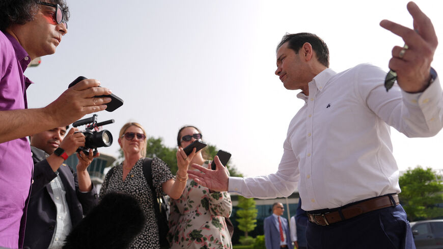 United States Secretary of State Marco Rubio speaks to the journalists before boarding his plane at Indira Gandhi International Airport in New Delhi, India, Monday, May 25, 2026.     Julia Demaree Nikhinson/Pool via REUTERS