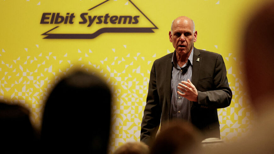 FILE PHOTO: Bezhalel Machlis, President and CEO of Elbit Systems, one of Israel's largest defence contractors speaks during Elbit's annual investor conference in Tel Aviv, Israel March 26, 2024. REUTERS/Carlos Garcia Rawlins/File Photo