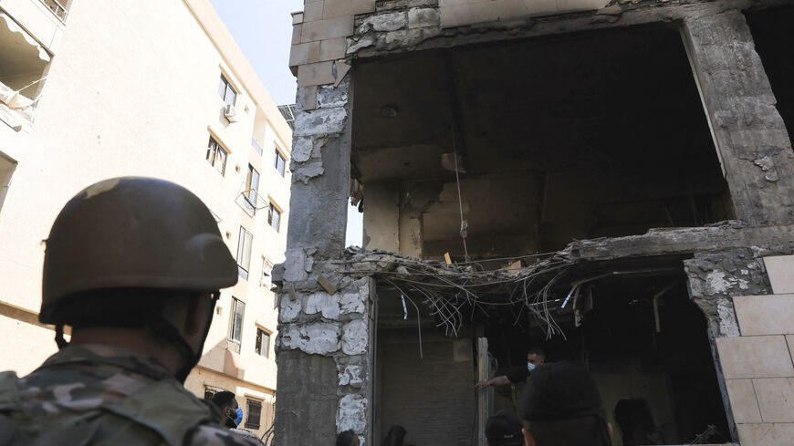 People inspect the damage at the site of an Israeli strike on Beirut's southern suburbs, Lebanon, May 28, 2026. REUTERS/Raghed Waked