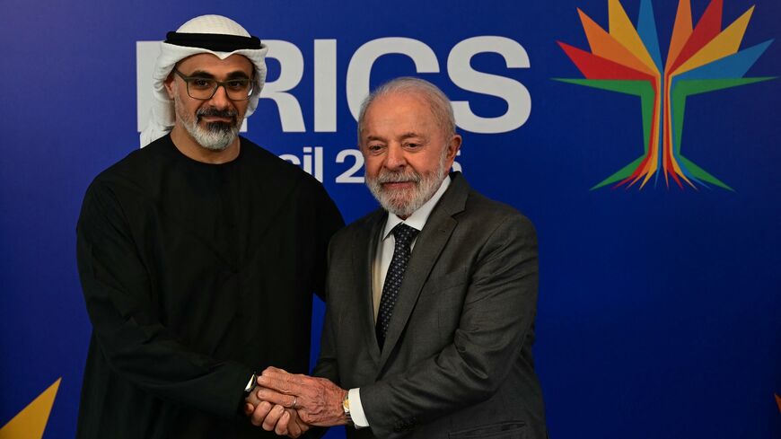 Abu Dhabi's crown prince, Sheikh Khaled bin Mohamed bin Zayed Al Nahyan, and Brazil's president, Luiz Inacio Lula da Silva, shake hands before a bilateral meeting ahead of the BRICS summit in Rio de Janeiro, Brazil, on July 5, 2025. 
