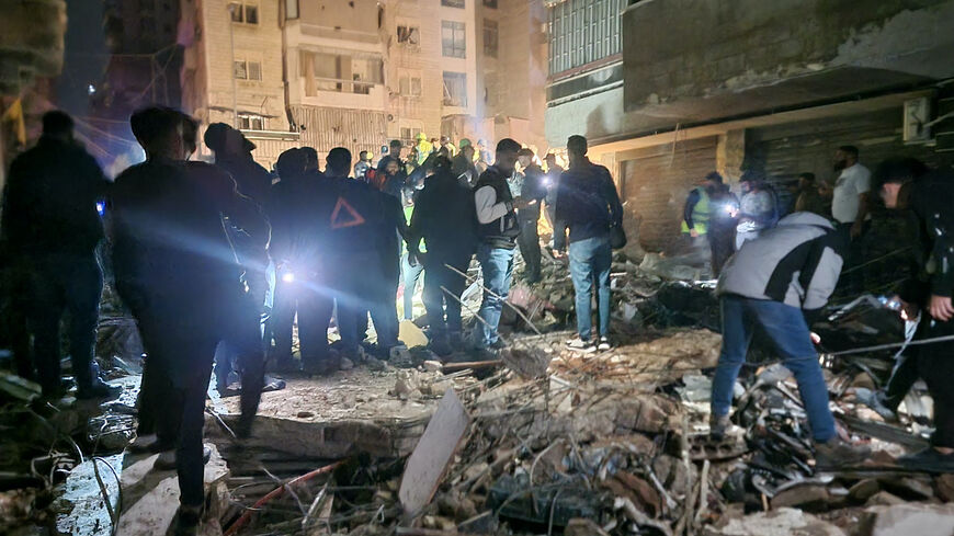 People gather at the site of an Israeli airstrike that targeted Beirut's southern suburbs neighborhood of Haret Hreik on May 6, 2026.
