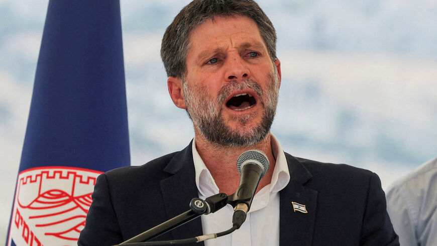 FILE PHOTO: Israeli Finance Minister Bezalel Smotrich speaks at a press conference regarding settlements expansion for the long-frozen E1 settlement, that would split East Jerusalem from the occupied West Bank, near the Israeli settlement of Maale Adumim in the Israeli-occupied West Bank, August 14, 2025. REUTERS/Ronen Zvulun/File Photo