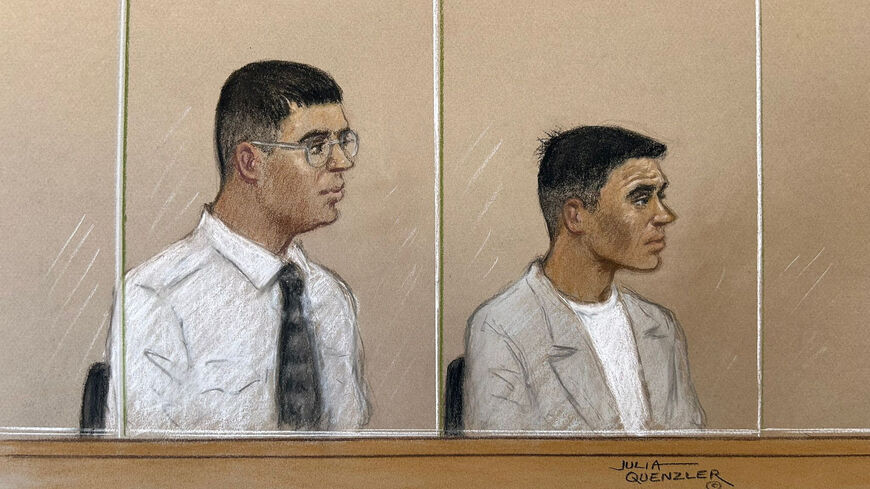 Nandito Badea and George Stana, two Romanian men accused of stabbing the Iran International journalist Pouria Zeraati near his home in Wimbledon in March 2024, appear at Woolwich Crown Court in London, Britain, May 18, 2026, in a courtroom sketch. REUTERS/Julia Quenzler