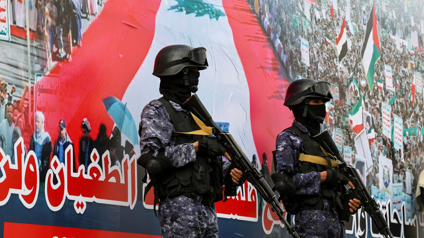 FILE PHOTO: Houthi security personnel stand guard during a demonstration in Sanaa, Yemen, April 17, 2026. REUTERS/Khaled Abdullah/File Photo