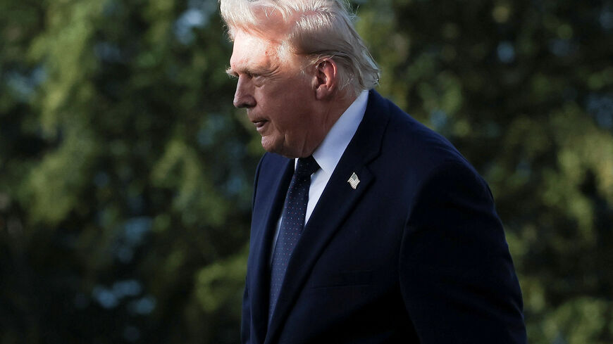 U.S. President Donald Trump walks during the G7 summit in Evian-les-Bains, France, June 15, 2026. REUTERS/Christian Hartmann