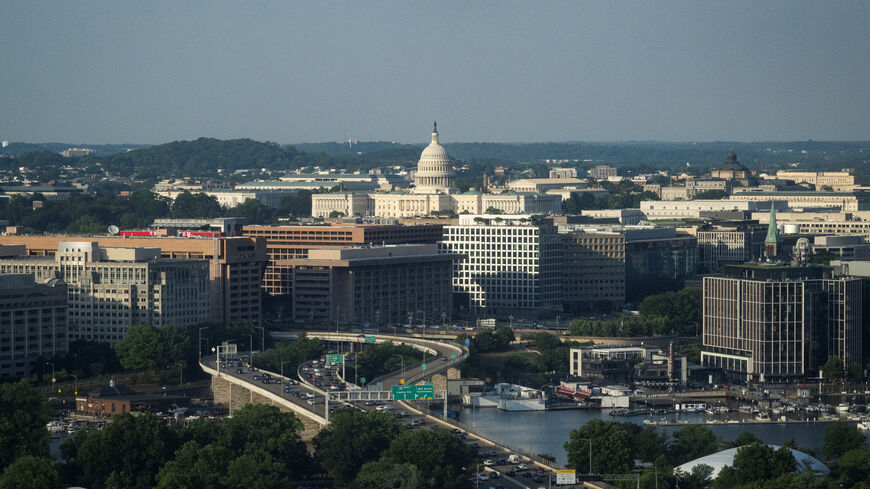 An aerial view, taken through the window of an airplane, of the U.S. Capitol building in Washington, D.C., U.S., June 11, 2026. REUTERS/Graeme Sloan