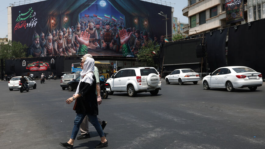 People walk on a street in Tehran, Iran, June 18, 2026. Majid Asgaripour/WANA (West Asia News Agency) via REUTERS