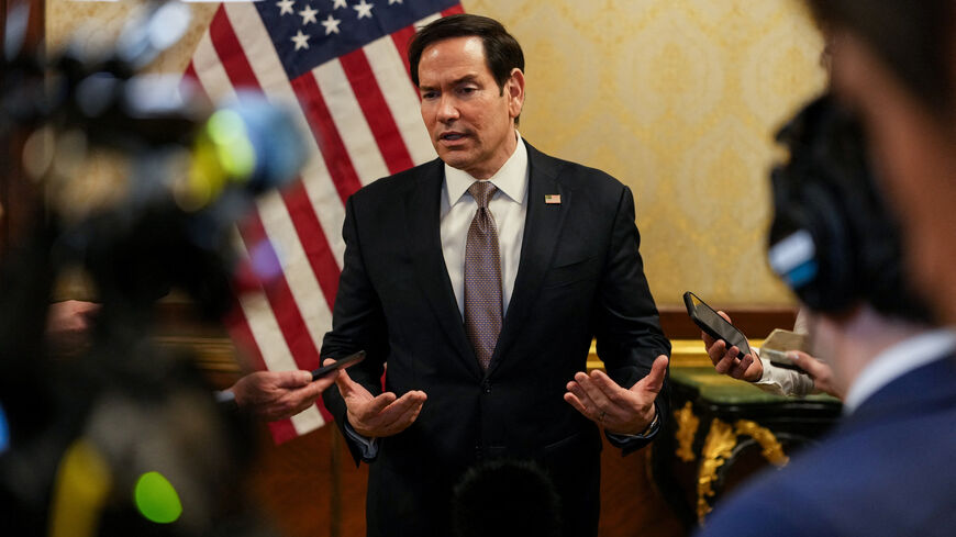 U.S. Secretary of State Marco Rubio speaks to members of the media before boarding a U.S. Air Force C-17 Globemaster III transport aircraft en route to Bahrain during his visit to the Middle East to discuss the interim deal between the U.S. and Iran with Arab Gulf allies, at Kuwait International Airport, June 24, 2026. REUTERS/Eric Lee/Pool