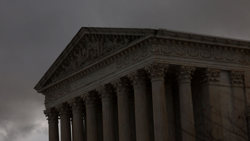The sun sets on the U.S. Supreme Court building after a stormy day in Washington, U.S., November 11, 2022. REUTERS/Leah Millis