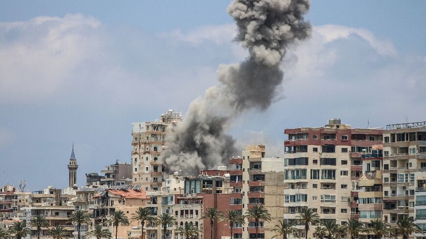 Smoke rises following an Israeli airstrike in Tyre 