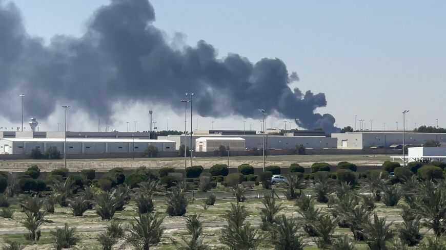 Smoke rises from an area of Kuwait's international airport after a reported drone strike on April 1, 2026. 
