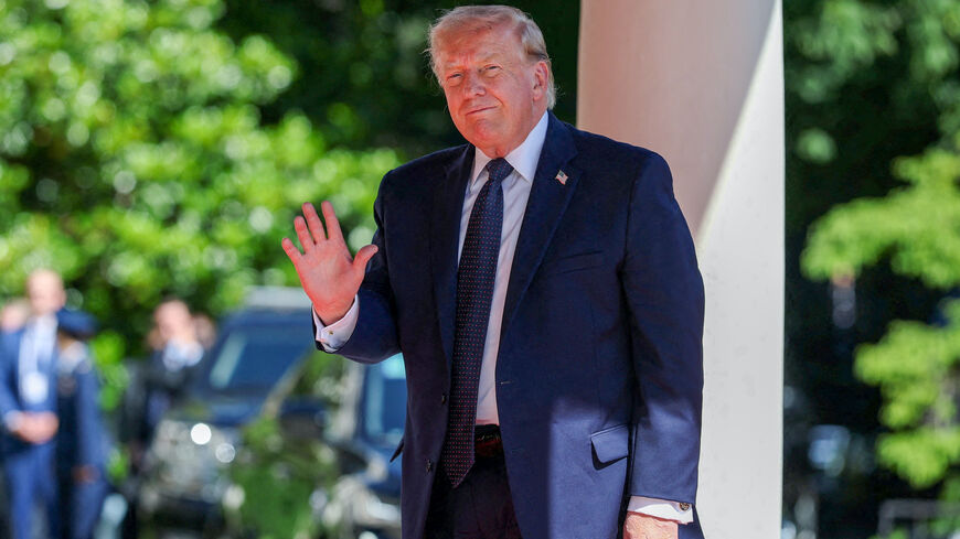 US President Donald Trump arrives for the G7 Leaders' Summit at the Hotel Royal, Evian Resort on June 15, 2026 in Evian-les-Bains, France. 