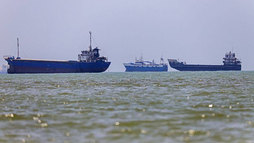 In this picture obtained from Iran's ISNA news agency on June 18, 2026, vessels are seen anchored in Bandar Abbas along the Strait of Hormuz. 