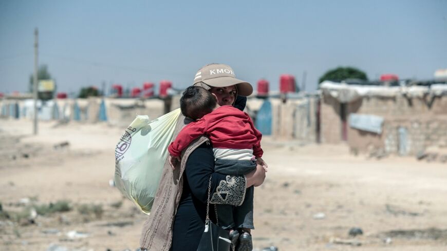 Syrian Kurds displaced from Ras al-Ain complain they can not return to their homes depsite the end of the Syrian war, as Tirkish-backed fighters have moved in