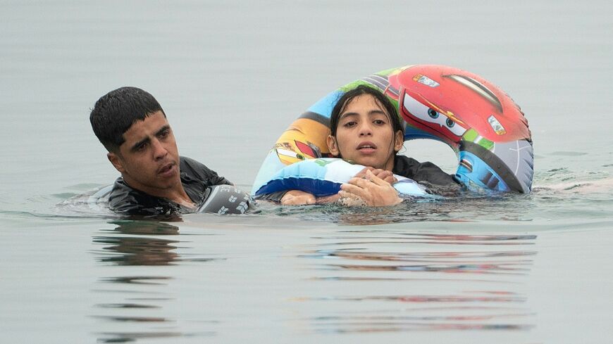 A local official said 60,000 migrants had entered Cueta. Spain's interior ministry said 25,000 of them had voluntarily returned to Morocco