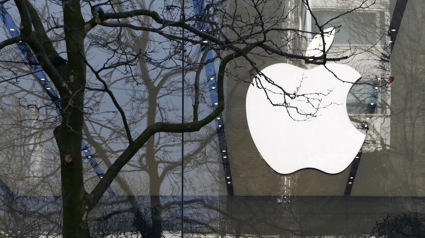 An Apple logo is seen at the entrance of an Apple Store in downtown Brussels, Belgium March 10, 2016.   REUTERS/Yves Herman
