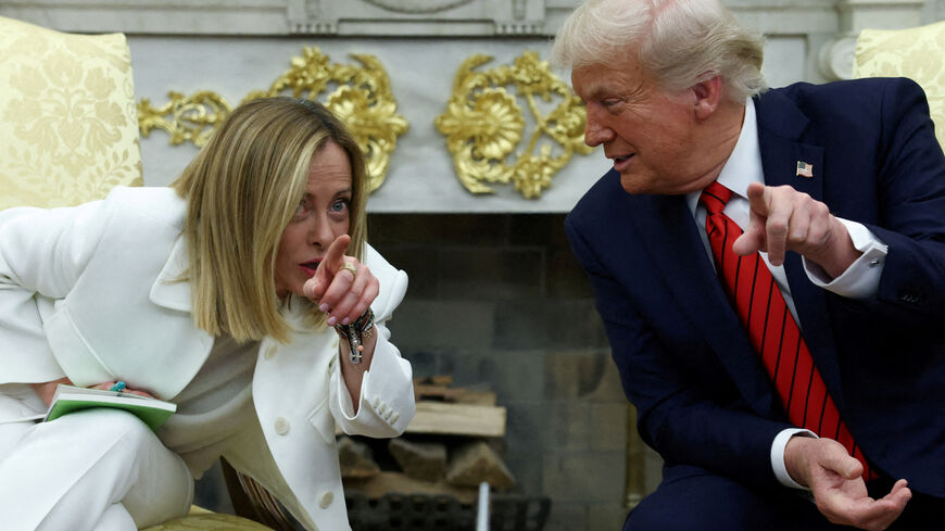 FILE PHOTO: U.S. President Donald Trump meets with Italian Prime Minister Giorgia Meloni in the Oval Office at the White House in Washington, D.C., U.S., April 17, 2025. REUTERS/Evelyn Hockstein/File Photo