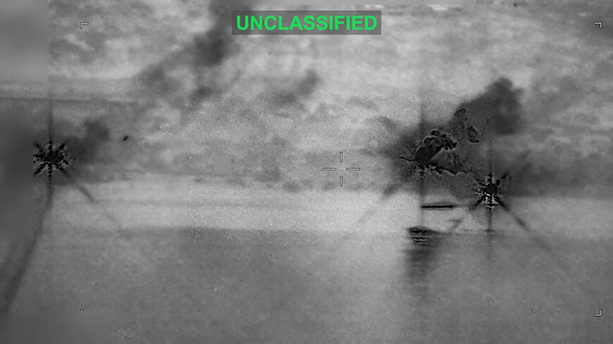 Smoke rises at an unknown location following what the U.S. Central Command says is a new wave of strikes against Iran on Tuesday after three tankers were hit by projectiles in the Strait of Hormuz, in this still image taken from video released July 7, 2026.    U.S. Central Command/Handout via REUTERS