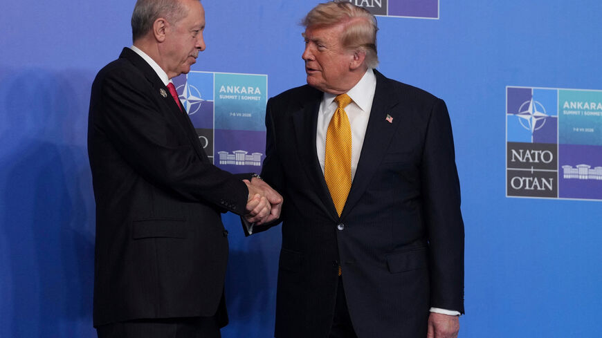 U.S. President Donald Trump, is greeted by Turkish President Recep Tayyip Erdogan as he arrives for the NATO summit in Ankara, Turkey, Wednesday, July 8, 2026.     Alastair Grant/Pool via REUTERS