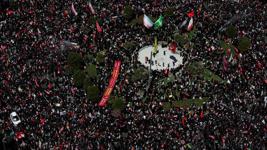 Mourners gather on the day of the burial of Iran's late Supreme Leader Ayatollah Ali Khamenei, who was killed on February 28 in Israeli and U.S. airstrikes, in Mashhad, Iran, July 9, 2026. REUTERS/Mohammed Salem  \
